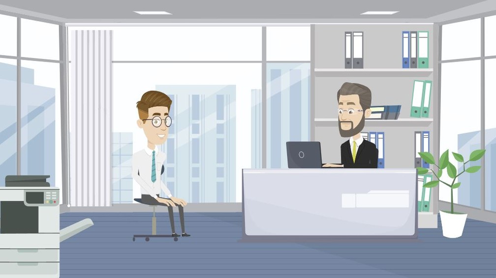 Das Bild zeigt Sebastian Seidel im Gespräch mit der Führungskraft in seinem Büro im Unternehmen.